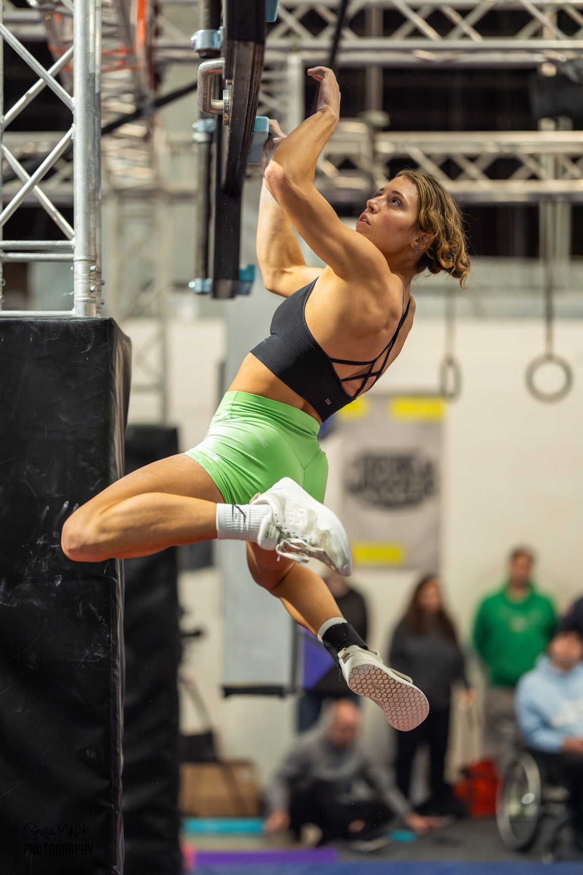 Athlete demonstrating agility in a vibrant California footwear setting.